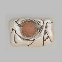 Carence Crafters Arts & Crafts "Celtic" Brooch, sterling set with a large round cabochon rose quartz jewel, signed, c. 1910