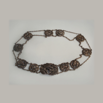 Late 19th Century Asian "Dragon" sterling belt with high relief work and set with rock crystal cabochon jewels, signed, c. 1900