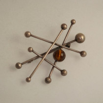 Niels Erik From, Denmark, "Atomic" brooch, sterling with cabochon tiger's eye, signed, c. 1950's