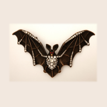 French Art Nouveau "Bat" Buckle, silvered brass set with clear and red paste jewels, c. 1900