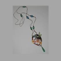 Elizabeth Bonté "Honey Bee" Pendant necklace, carved and stained horn with glass beads and metallic woven cord, c. 1900