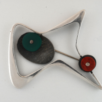 Margaret De Patta, Important Abstract Brooch, sterling in a biomorphic design set with rondels of chrysoprase and carnelian, signed, c. 1945, Model illustrated: Design 1935 - 1965, What Modern Was: selections from the Liliane and David M. Stewart collection ed. Martin Eidelberg, (Montreal/New York: Le Musée des Arts Décoratifs de Montréal/Harry N. Abrams, 1991), p. 100, illus. 130.