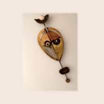 Peter Macchiarini "African Mask" Brooch, copper and brass set with bone details, signed, c. 1950's