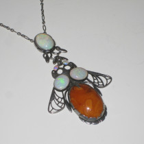 Evald Nielsen "Moth" Pendant necklace, openwork sterling set with 5 oval cabochon fire opals and a large oval amber jewel, marked, c. 1895