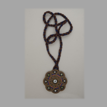 Late 19th Century Russian "Circles" silver buckle (hanging on a silk cord) set with green and white quartz jewels and champleve enamel, c. 1885