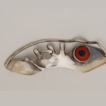 Sam Kramer "Fish Eye" Abstract Brooch, sterling set with a glass eye, signed, c. 1950's