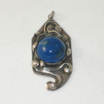 Chicago Arts & Crafts "Leaf" Pendant, hammered sterling set with a large round sodalite cabochon jewel, marked, c. 1910