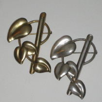 Guglielmo Cini "Leaf Trellis" Pair Of Brooches, sterling with one brooch gilded, signed, c. 1920's