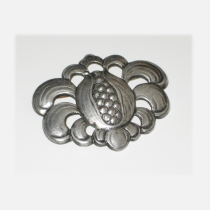 Kalo Shop, Chicago "Pomegranate" Brooch, hammered sterling with cut-out details, signed, c. 1920