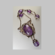 James Winn, Chicago, Important Arts & Crafts "Celtic" Pendant Necklace, hammered and chased sterling with large cabochon amethyst jewels, signed and dated 1904, This model was most likely shown in the 1904 St. Louis Exhibition, Exhibited: “Tiffany and the Gilded Age”, September 21, 2008 – January 4, 2009, Nassau County Museum of Art, Roslyn Harbor, NY