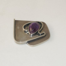 American Studio "Abstract" Brooch, sterling set with a tear drop shaped cabochon amethyst, marked, c. 1950's