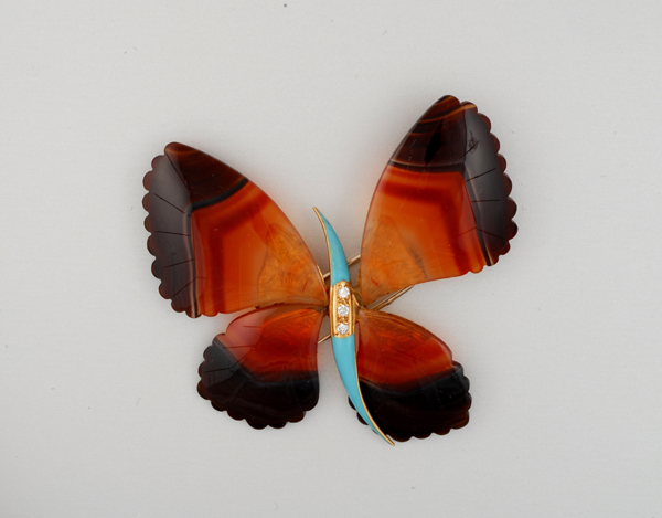 French butterfly brooch with banded carnelian agate, blue enamel and diamonds set in 18K gold, marks, c. 1950’s