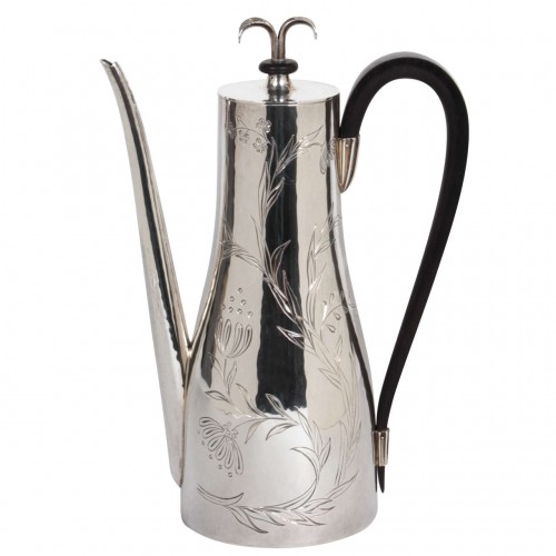 Tommi Parzinger, Sterling silver coffee pot with meandering floral and leaf design, ebony handle and finial detail c. 1938