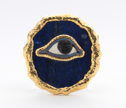 David Webb, Important “Eye of Horus” brooch, ancient Egyptian eye relic, lapis set in 18K gold, signed, c. 1960’s