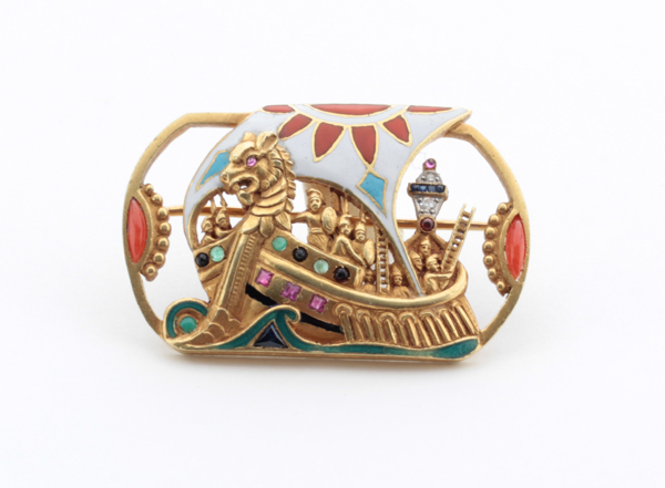 Fuset y Grau Joyeros, Barcelona, “Viking” brooch elaborately gem set with diamonds, rubies, sapphires, emeralds  and coral and champleve enamel details throughout in 18K gold, marked, c. 1900