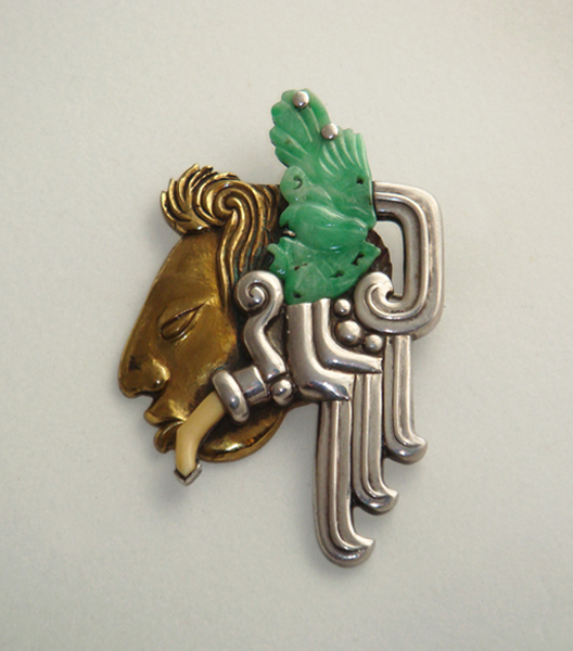 Antonio Pineda “Quetzalcoatl” brooch, sterling, Pre-Columbian jade, gilt sterling and bone, signed c. 1940’s
