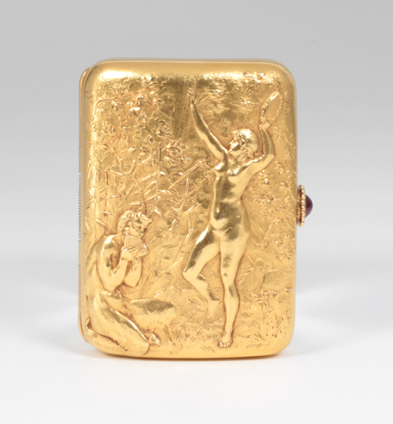 Theodore B. Starr New York, “Pan and the Muse” 18K gold box with exceptionally fine hand repousse work, set with a cabochon ruby, signed, c. 1890