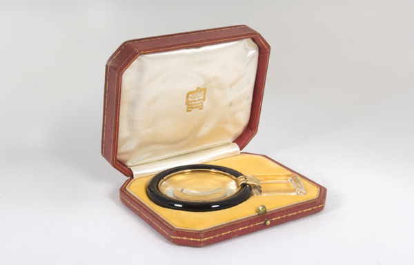 Cartier Paris, Magnifying glass, onyx, rock crystal and 18K gold, signed, original red leather box, c. 1920