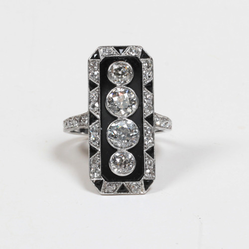 House of Koch (attr.), Art Deco diamond, onyx and platinum “Zig Zag” ring, original box, c. 1920’s
