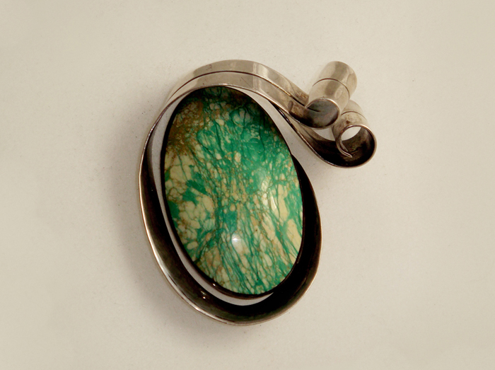 Enrique Ledesma “Oval Curl” brooch, silver with cabochon aventurine, signed c. 1940’s