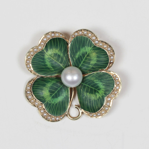 Gallet & Co. New York, “Four leaf Clover” brooch, delicately enameled 14K gold set with seed pearls and a large center pearl, signed, c. 1920’s