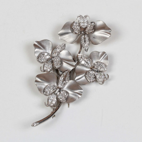 French Art Deco “Orchid” brooch, matte finished platinum Cymbidium orchid spray set with pave diamonds (approx. 9 carats TW), marked, c. 1935