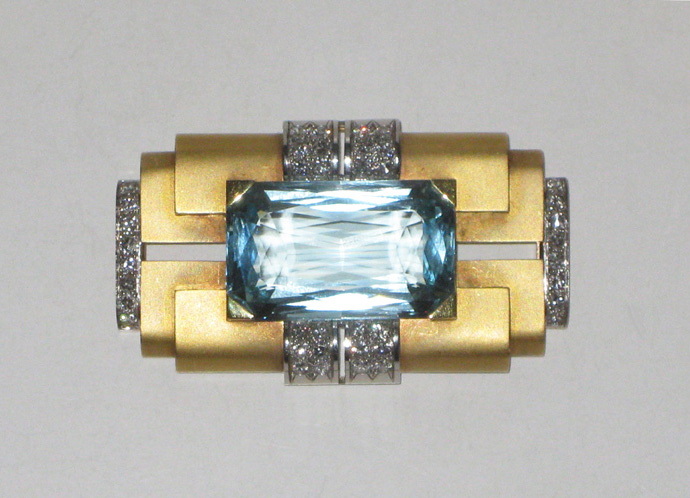 Rene Boivin (attr.) French Art Deco brooch set with a large rectangular aquamarine and diamonds set in a geometric platinum and matte finish 18K yellow gold, signed c. 1930’s