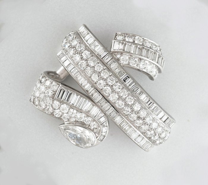 Paul Flato diamond brooch, round and baguette diamonds with a pear shaped diamond (approx. 10 carats TW) all set in platinum, signed, c. 1930