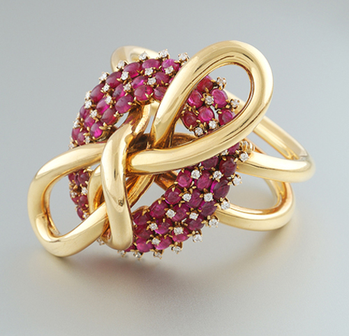 Fulco di Verdura for Paul Flato “Bow” bracelet, 18K yellow gold set with 57 cabochon rubies (approx. 55 carats TW) and 57 round diamonds (approx. 7.50 carats TW) c. 1938