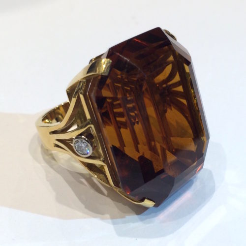 Retro large “Madeira” step-cut rectangular citrine ring (approx. 100 carats) set in 18k yellow gold with two round diamonds, c.1940’s