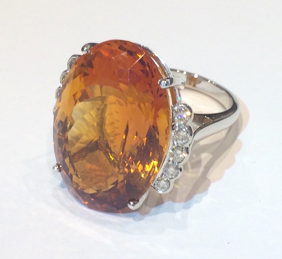 European large oval orange citrine (approx. 45 carats TW) set in 18K white gold with diamonds, c. 1960’s
