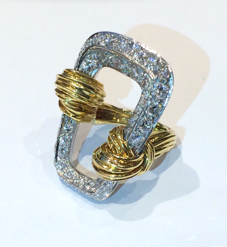 Joseph Kutchinsky, London (1914-2000) “Wrapped Cloth” ring in 18K yellow gold with a platinum tapered rectangular form pave set with 37 round diamonds (approx. 8 carats TW) , signed, 1973 (London gold mark small “s” for 1973) (illustrated: Christie’s Twentieth-Century Jewelry, Sally Everitt and David Lancaster (New York: Watson-Guptill Publications, 2002) p.113.