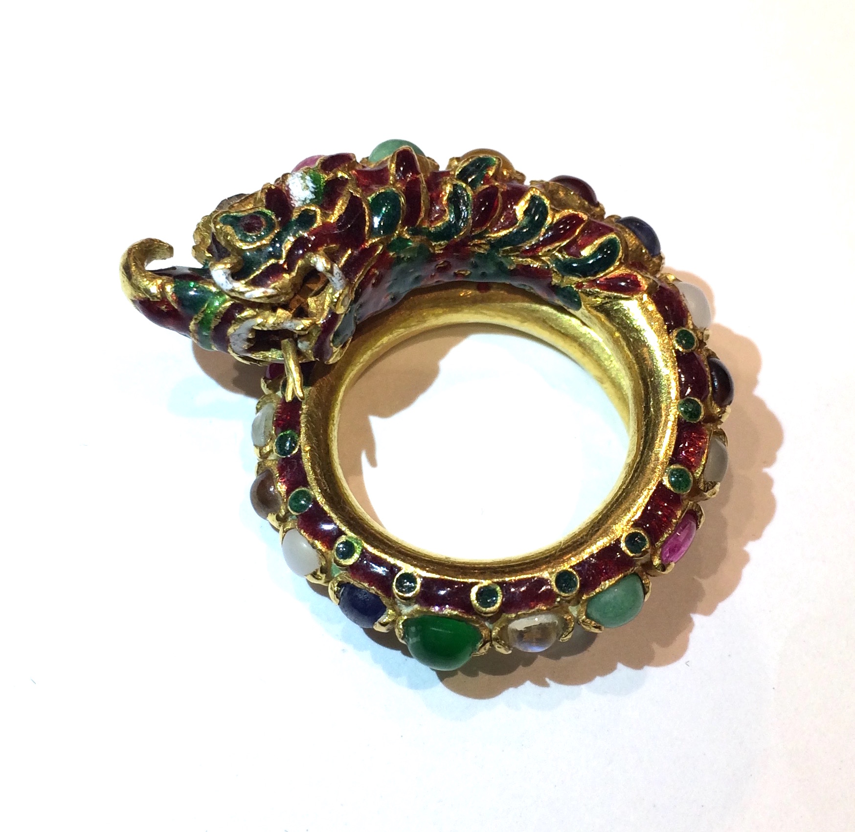 Burma, “Naga” dragon ring, high carat gold (22K +) enameled and set with 27 cabochons consisting of rubies, sapphires, emeralds, diamonds and other precious stones, second half 18th Century