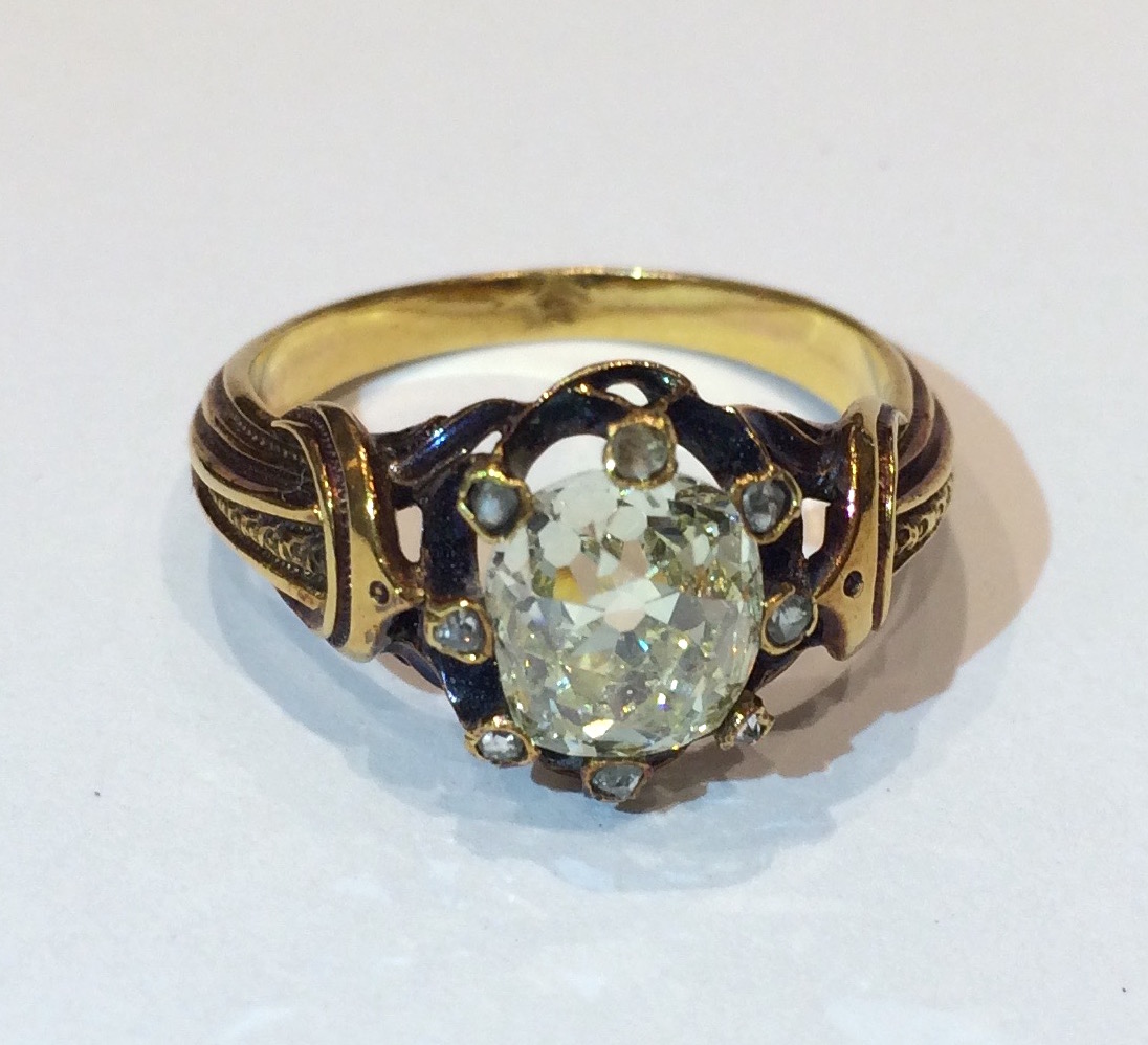 French 19th Century light yellow natural color diamond (approx. 2.20 carats TW, G.I.A certificate, 8.05 x 6.90 x 5.05mm, natural diamond) ring set in a fancy 18K yellow gold mounting, signed, numbered 3056, c. 1890