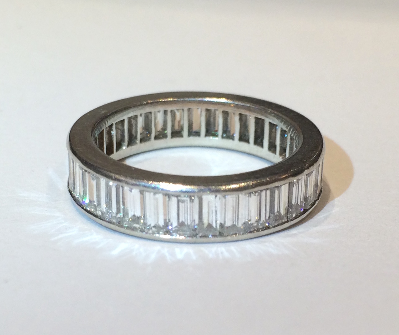 American Baguette diamond (approx. 6 carats TW) and platinum eternity ring, c. 1940