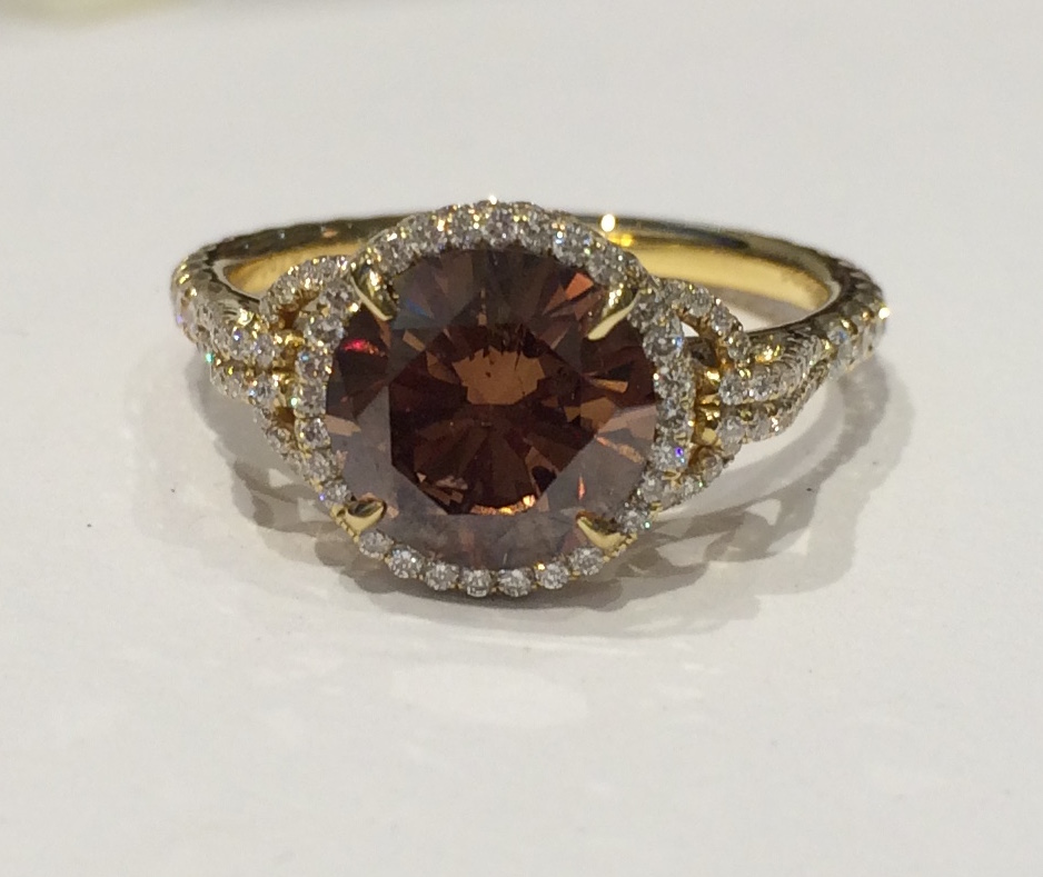 Neil Lane solitaire “Cognac” orange/brown diamond ring (1.87 carats natural color, GIA certificate) set in a double loop through design all in 18k gold with micro pave work throughout, signed, c.2006