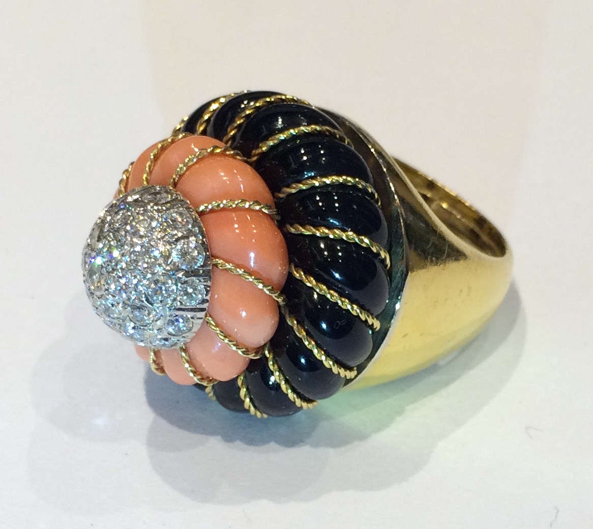 Italian “Cake” ring with coral, onyx and diamonds in an 18K gold mount, marked, c. 1950’s