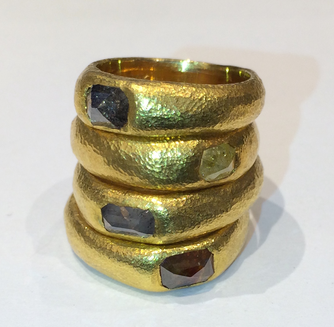 Neil Lane, Hand wrought 14K yellow gold rings with high carat gold plating set with table cut colored diamonds, signed, c. 2010