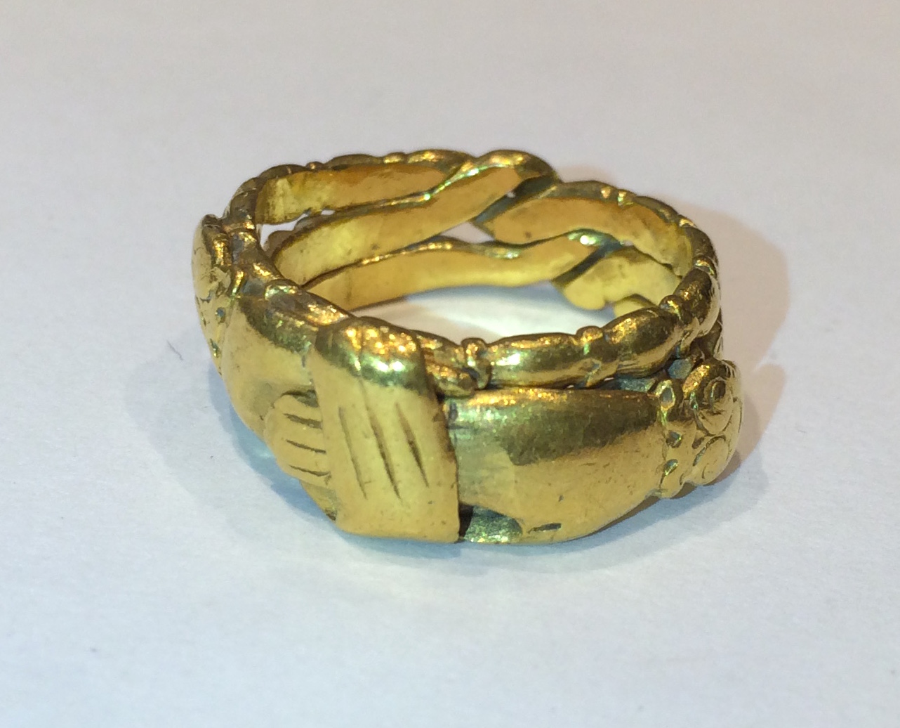 Chinese “Hands of Buddha” puzzle ring, 24K gold, c. 1900