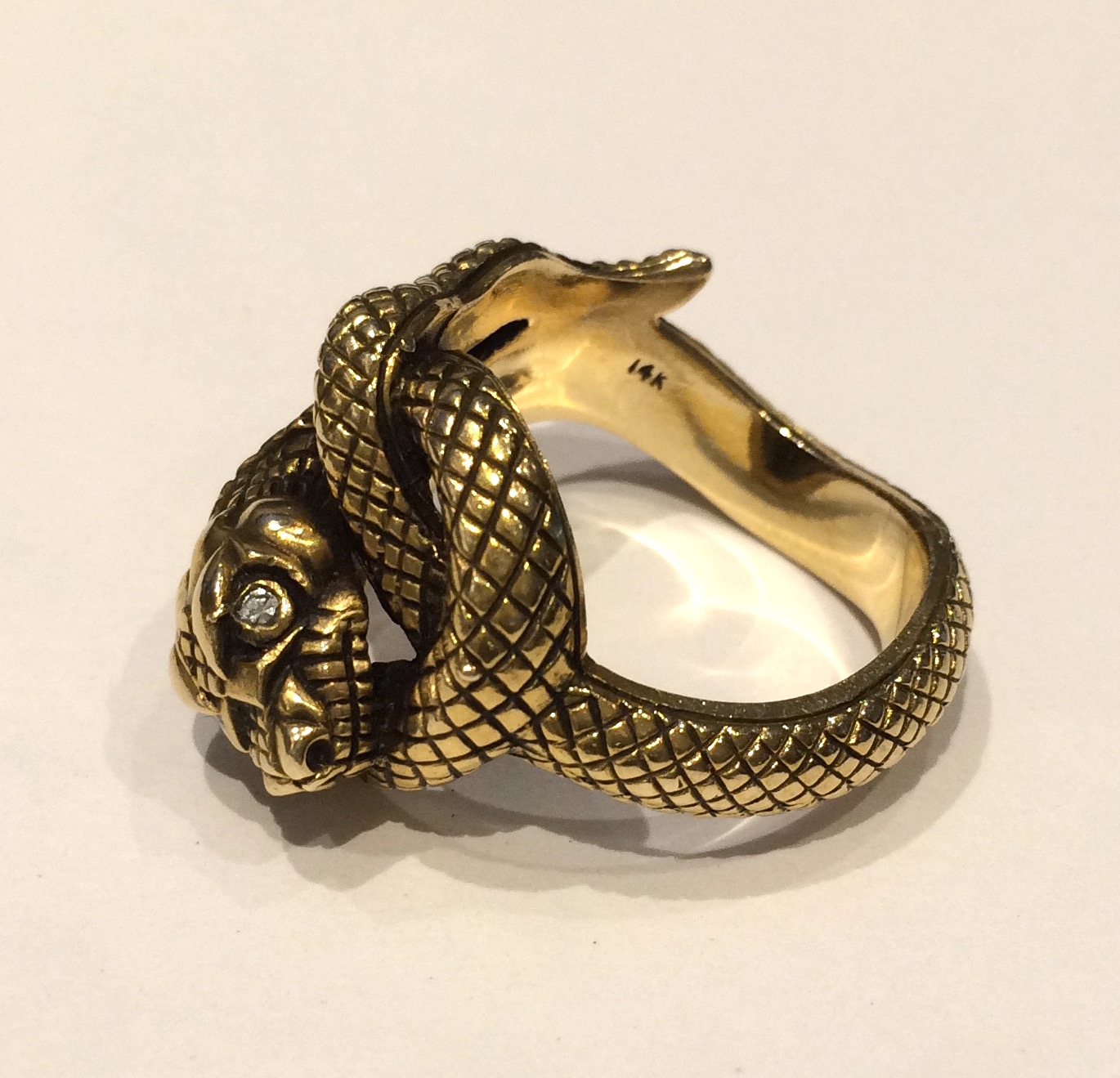 American “Coiled snake” ring, carved 14K gold with diamond eyes, marked, c. 1900
