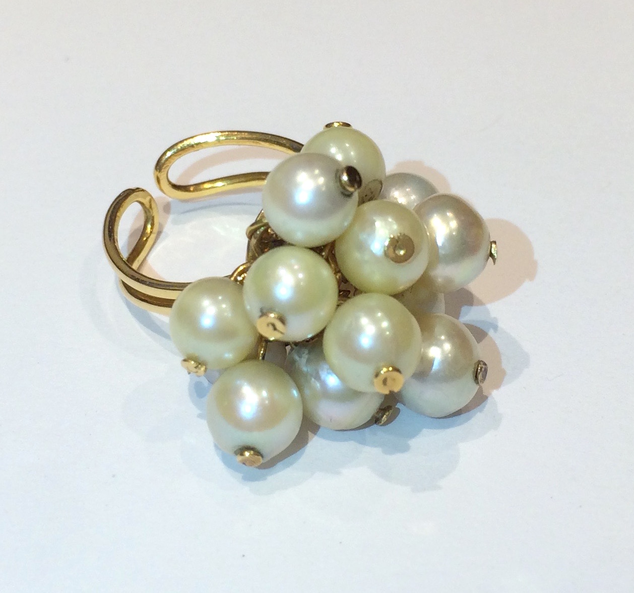 French “Pearl Pom Pom” ring, 18K gold mounted with 14 pearls, marked, c. 1950’s