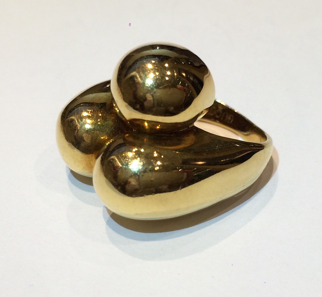 Gucci “Sculpture” ring, 18K yellow gold in a tripartite domed sculptural form, signed, c. 1970
