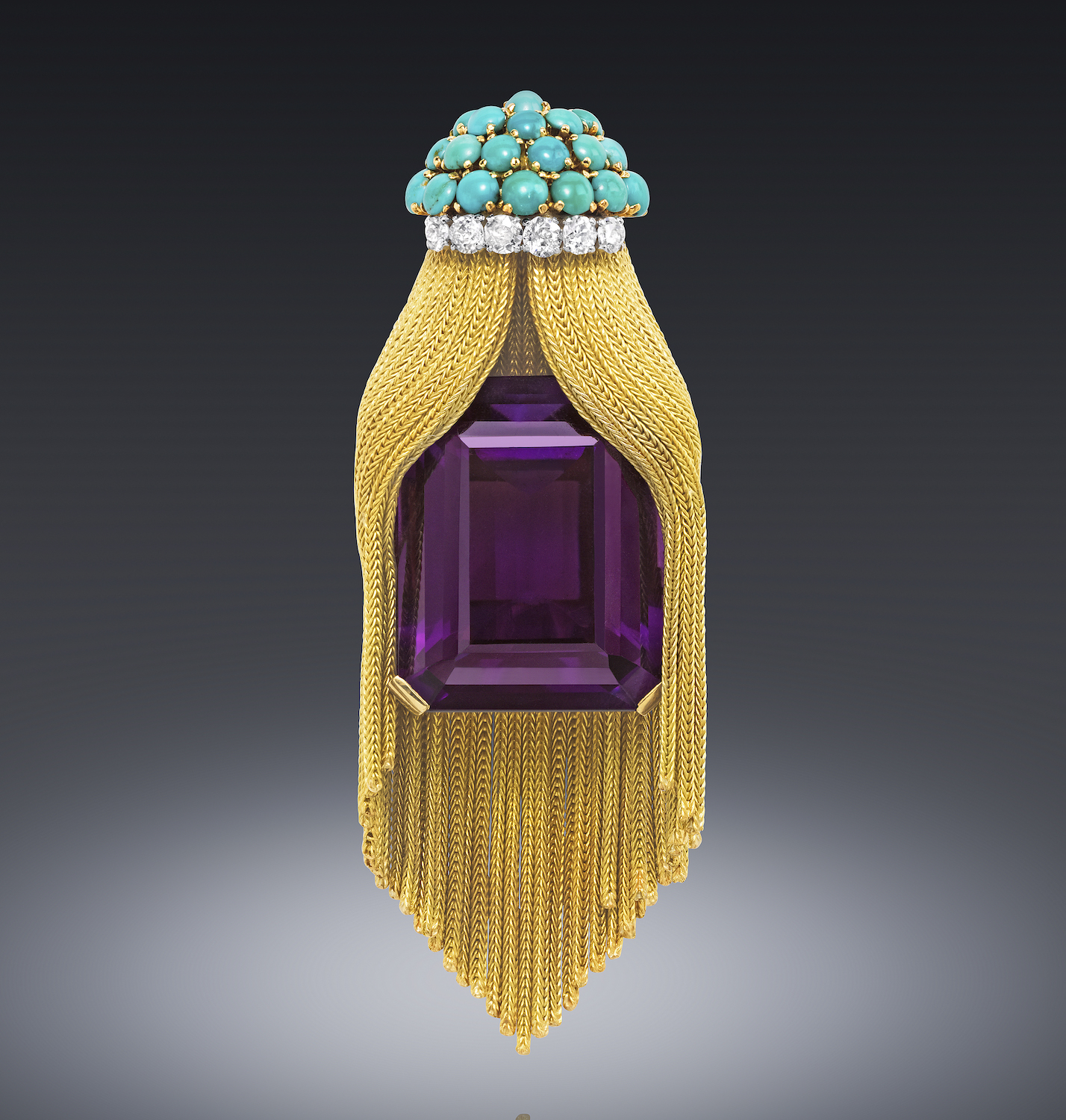 Gaucherand, Paris “Fringe Turban” shaped brooch set with a large emerald cut Siberian amethyst (approx. 70 carats), 6 round cut diamonds (approx. 1.50 carats TW) and 19 cabochon turquoise all set in 18k gold, signed, c.1950