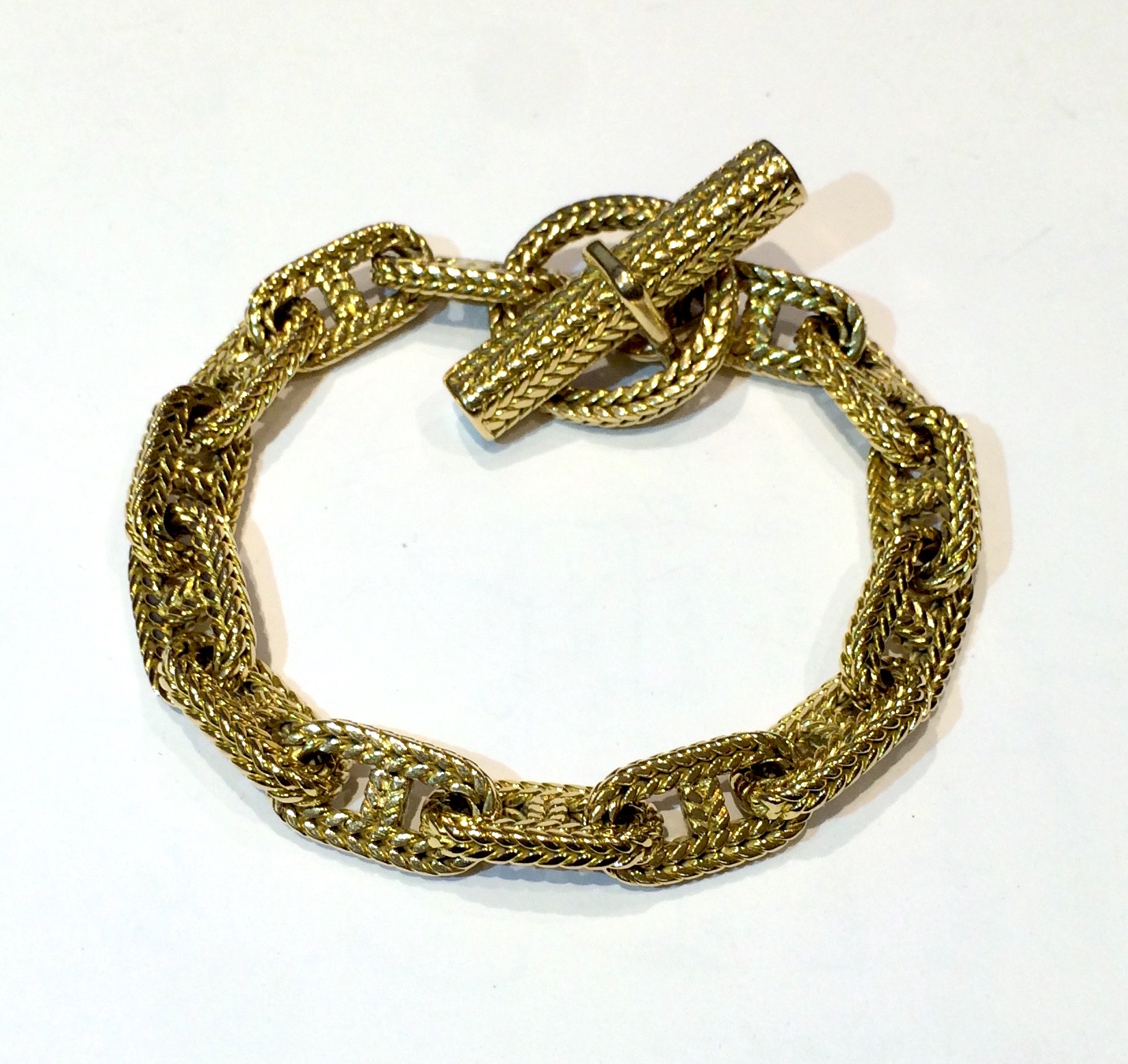 Hermes / Georges L’Enfant 18K yellow gold braided “tresse” Chaine D’Ancre bracelet (medium size links), signed, c.1970’s