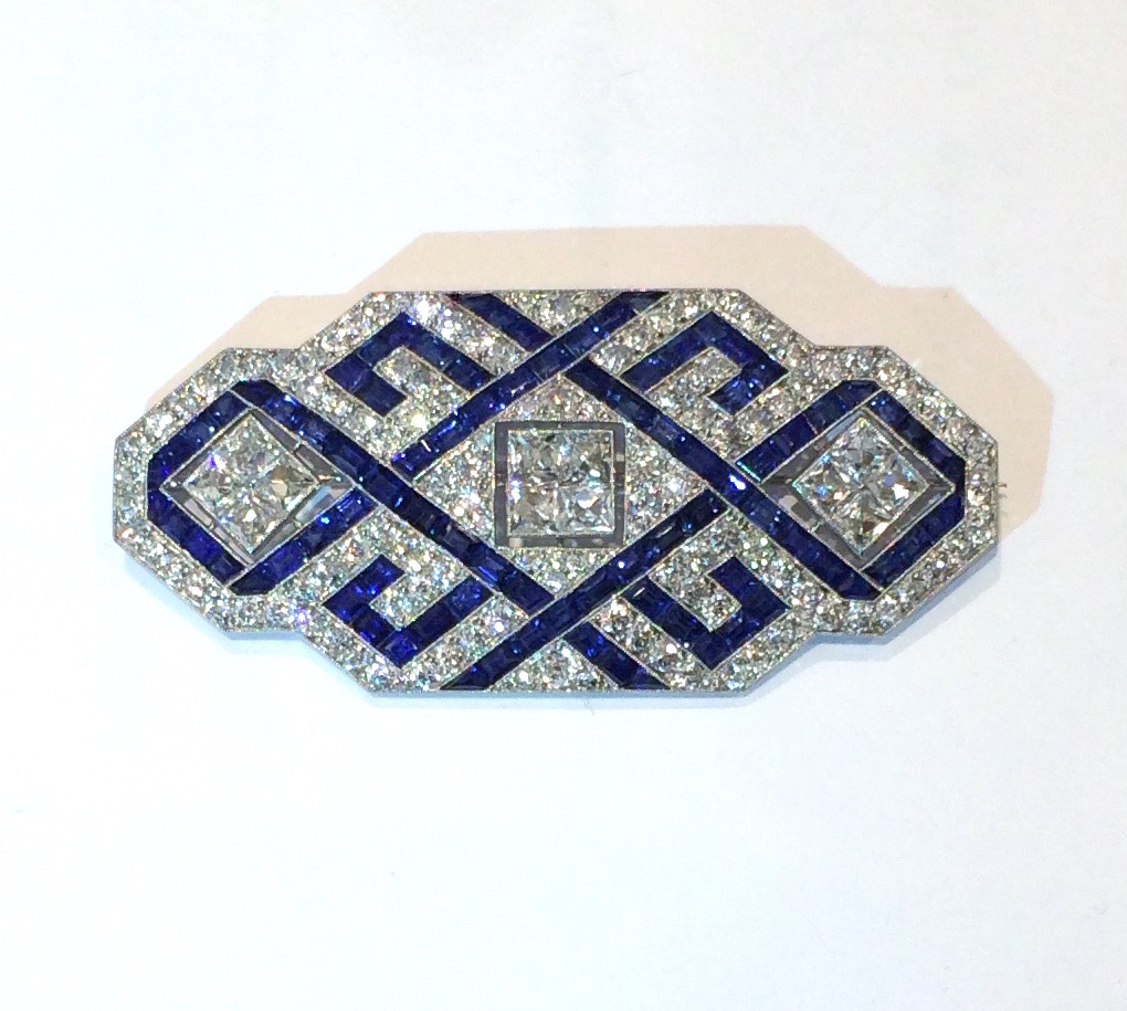 Mauboussin, Art Deco fancy sapphire and diamond brooch set in platinum, signed, c. 1930