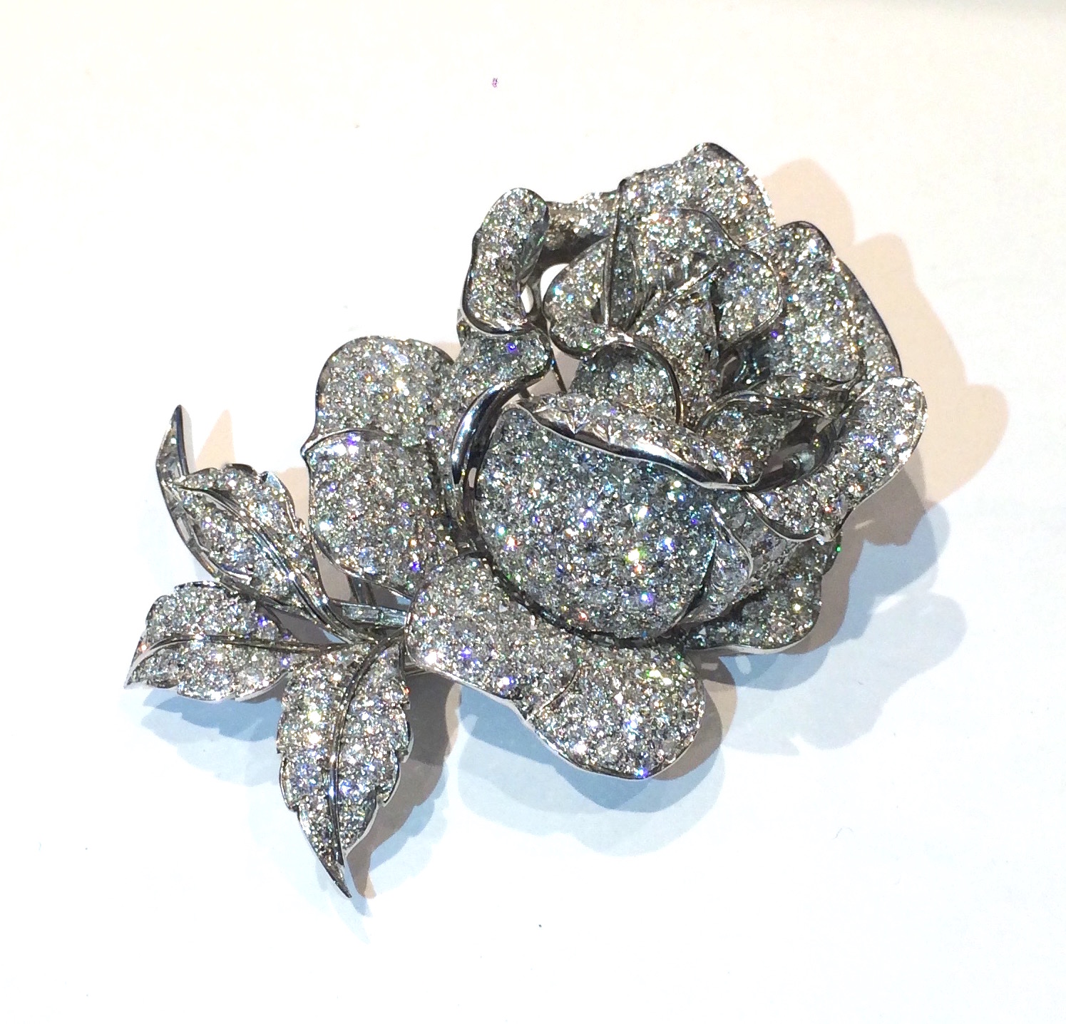 Paul Flato, sculptural “Rose” brooch, pave diamonds (approx. 40 carats TW) set in platinum, c. 1930’s