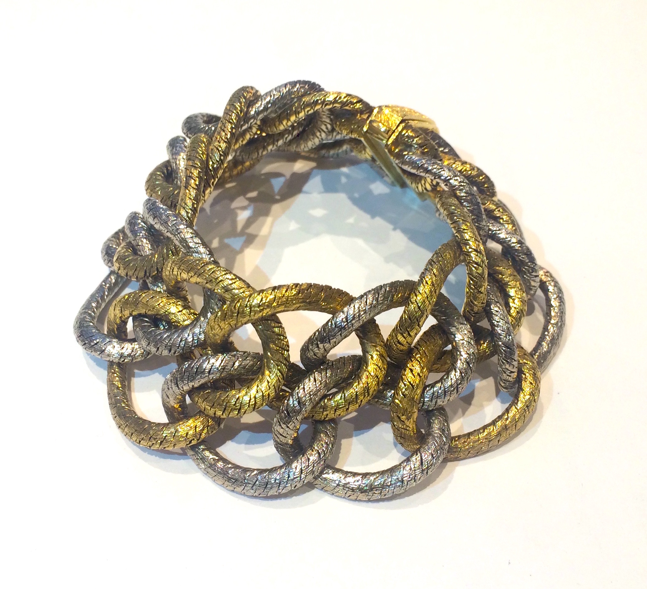 Retro (German) “Double Row” loop bracelet, woven yellow and white 18K gold, marked, c. 1960