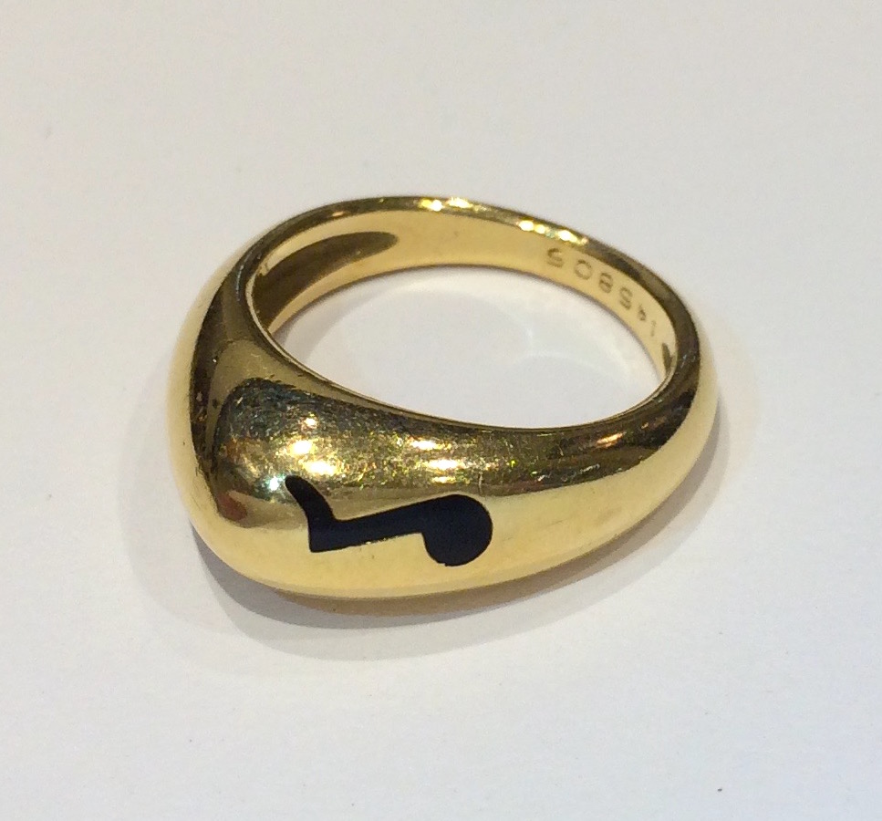 Chaumet Paris “Musical Note” ring, 18K gold with black champleve enamel note, signed, c. 1970’s