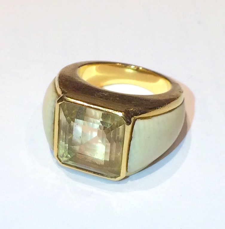 Boucheron Paris, Moderne ring set with a step cut square citrine (approx. 8 carats TW) and contoured bone details on either side all set in a solid 18K gold mount, signed, c. 1970’s