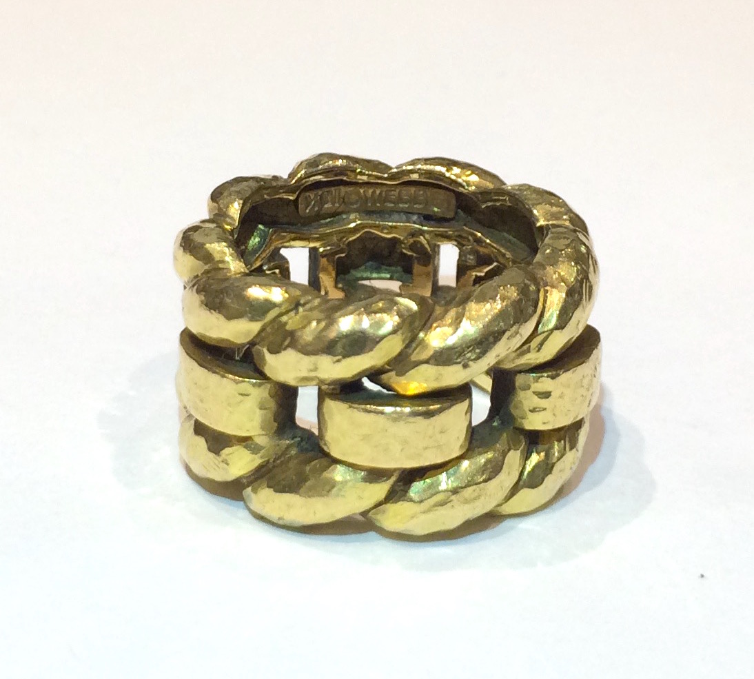 David Webb “Chain” ring in hand hammered and highly textured 18k gold, signed, c.1970’s